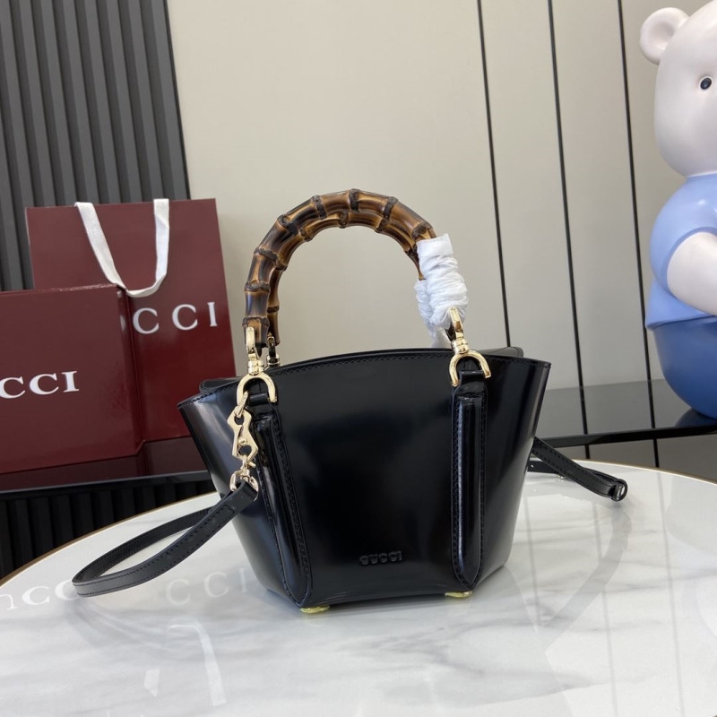 G*u*i top handle bags